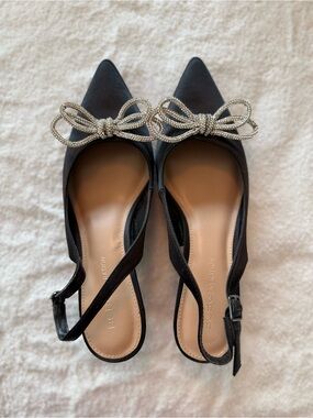BCBGeneration Black Pointed Slingback Flats with Crystal Bow Accent